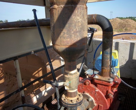 Slurry Pump at bottom of tank with discharge to containment area